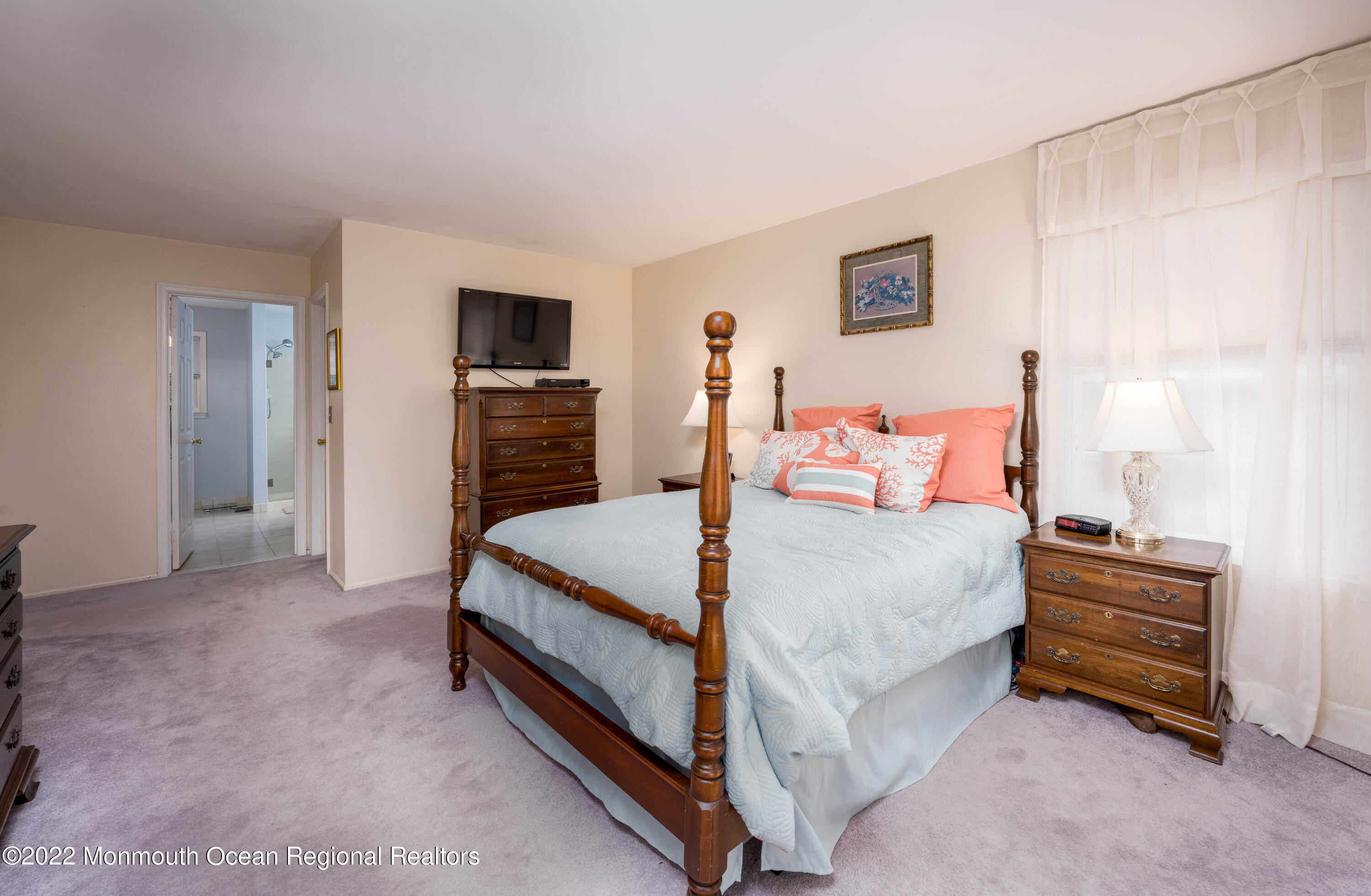 9 Metedeconk Road Howell, NJ 07731 - Photo 20 of 25 a bed room with a bed and a television