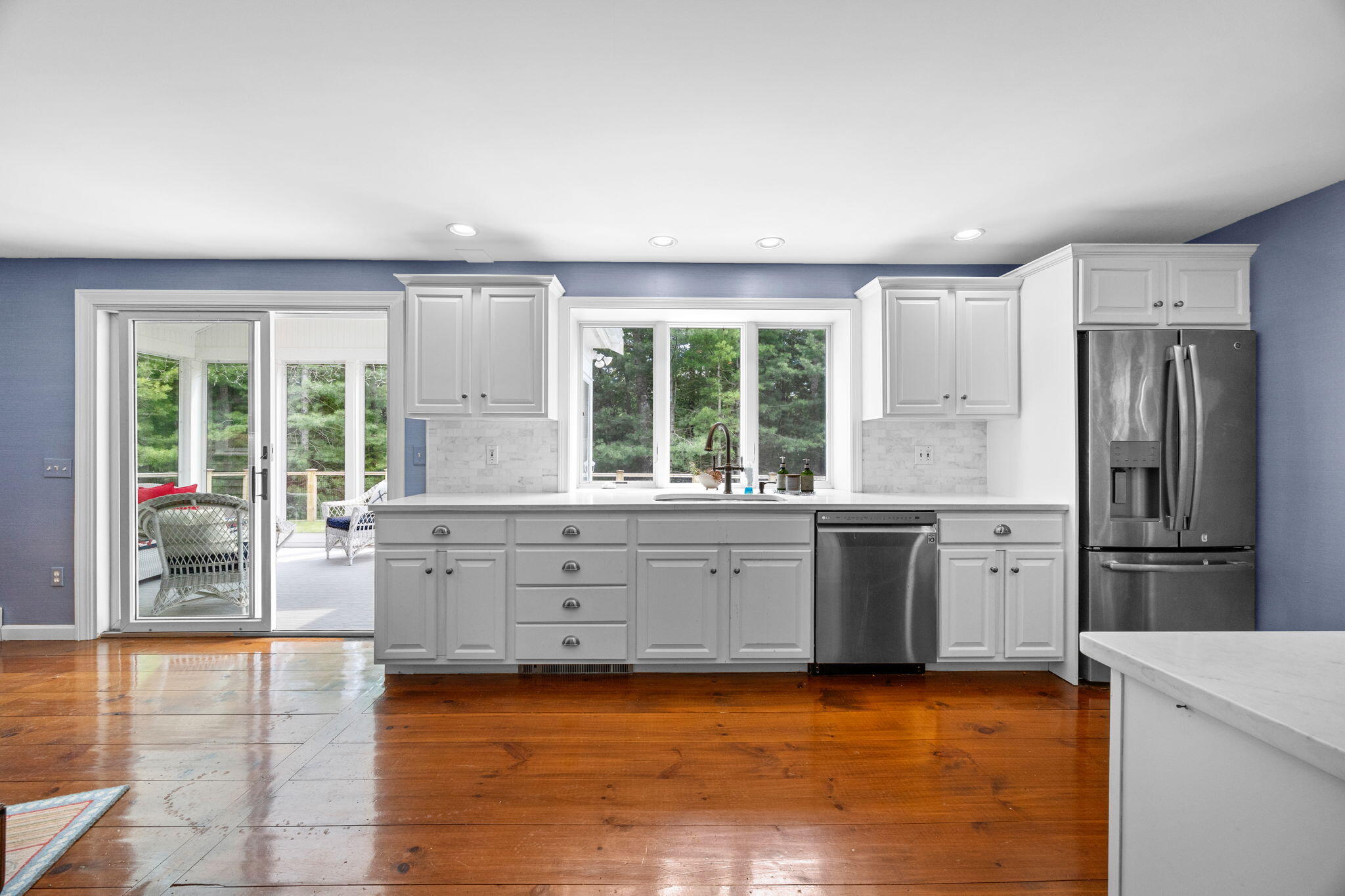 17 Cres Ridge Way Orleans, MA 02653 - Photo 12 of 47 a large kitchen with granite countertop a large window and a refrigerator
