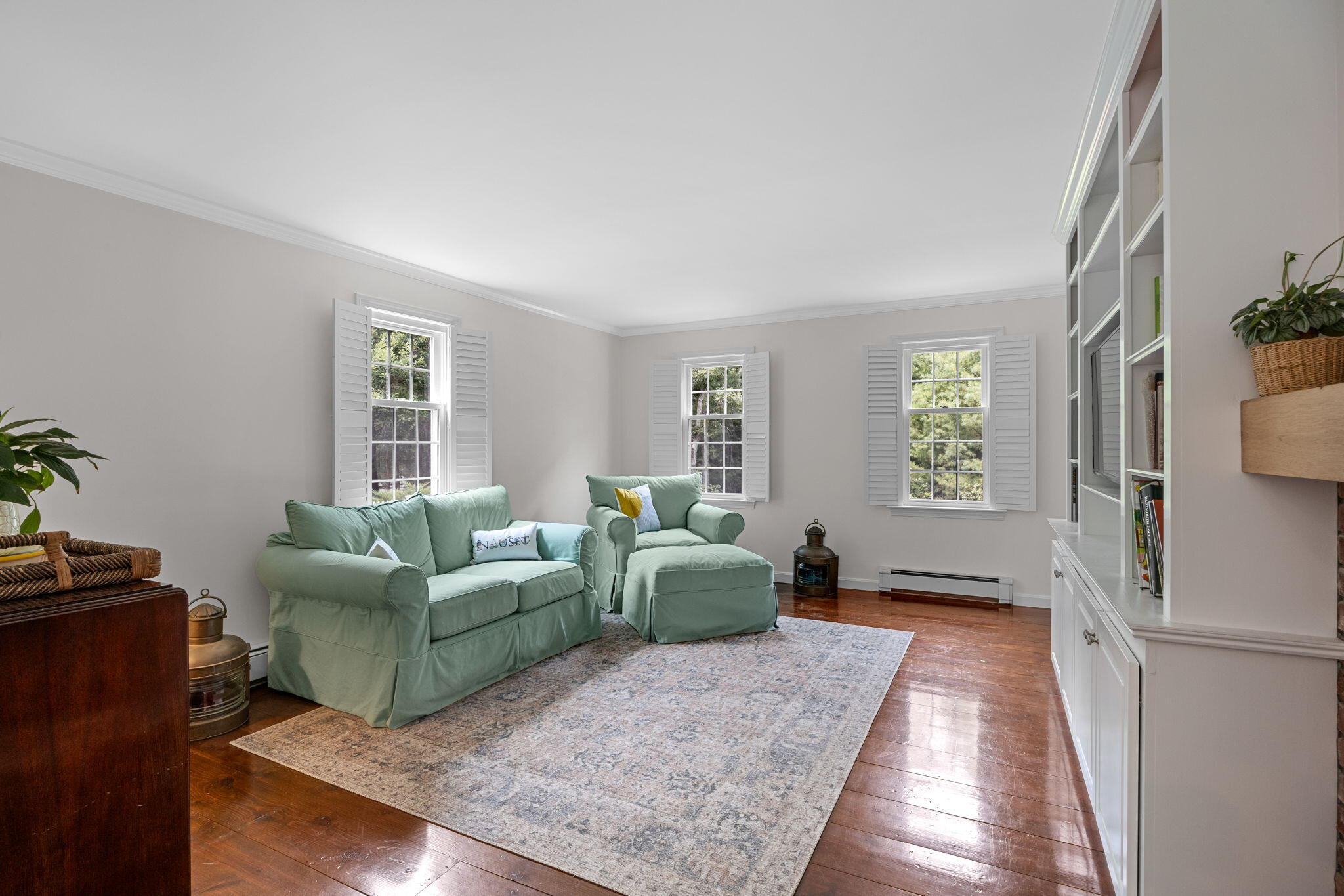 17 Cres Ridge Way Orleans, MA 02653 - Photo 15 of 47 a living room with furniture and a window