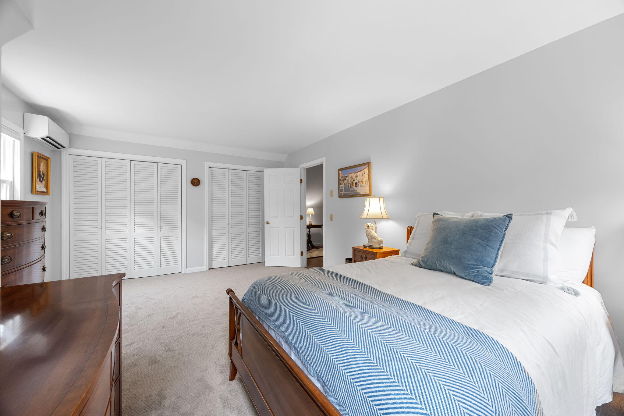 17 Cres Ridge Way Orleans, MA 02653 - Photo 34 of 47 a bedroom with a large bed and a tv