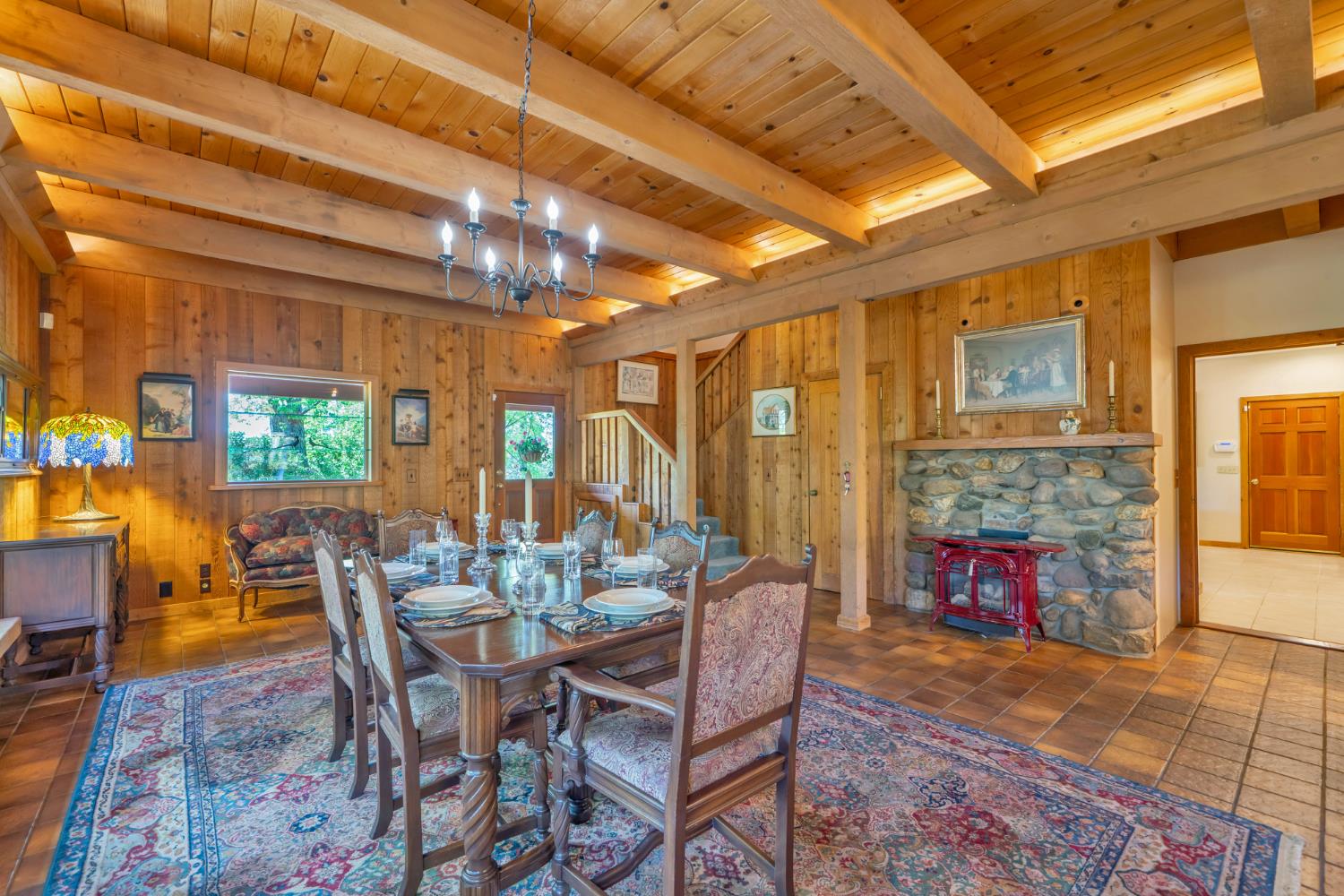 2399 Kingsgate Road Placerville, CA 95667 - Photo 19 of 89 a view of a dining room with furniture window and outside view