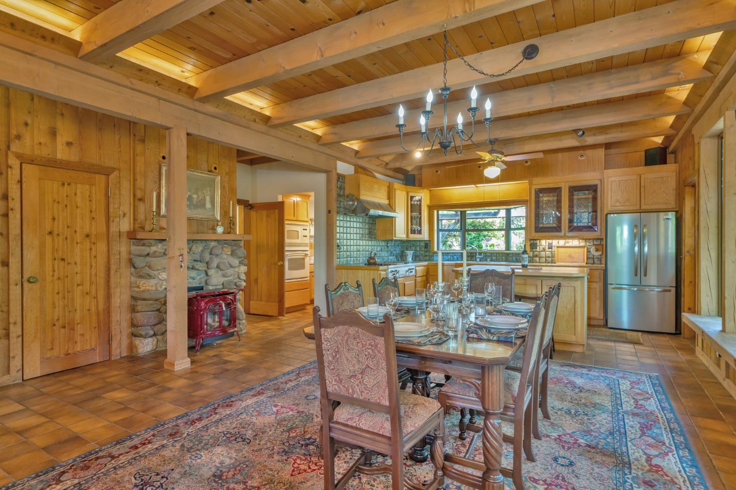 2399 Kingsgate Road Placerville, CA 95667 - Photo 20 of 89 a view of a dining room with furniture window and outside view