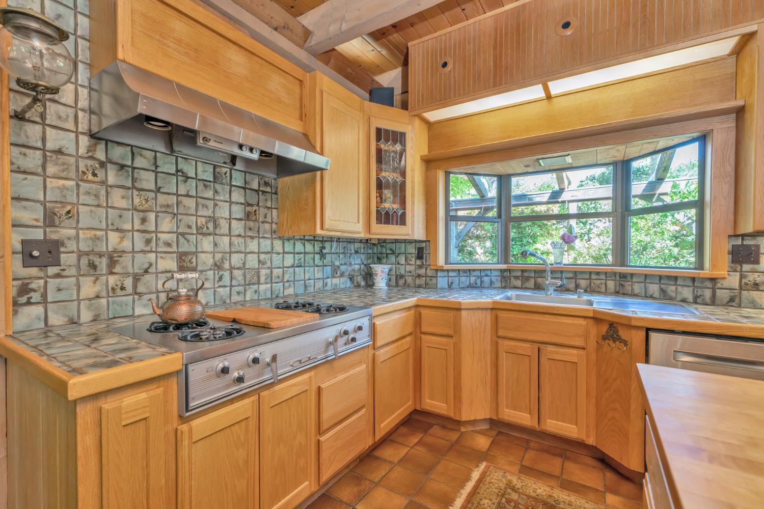 2399 Kingsgate Road Placerville, CA 95667 - Photo 23 of 89 a kitchen that has a sink and a stove