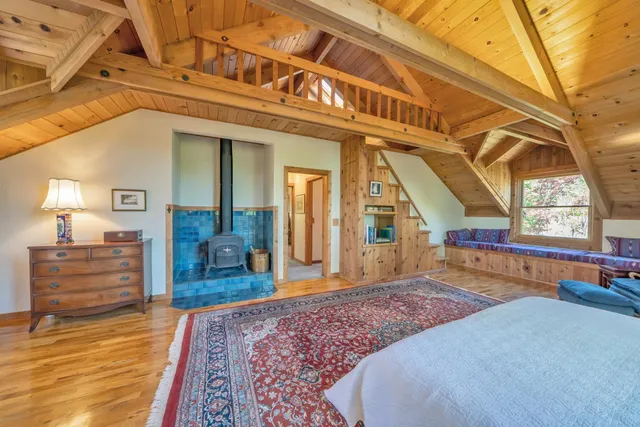 a bedroom with furniture and a couch