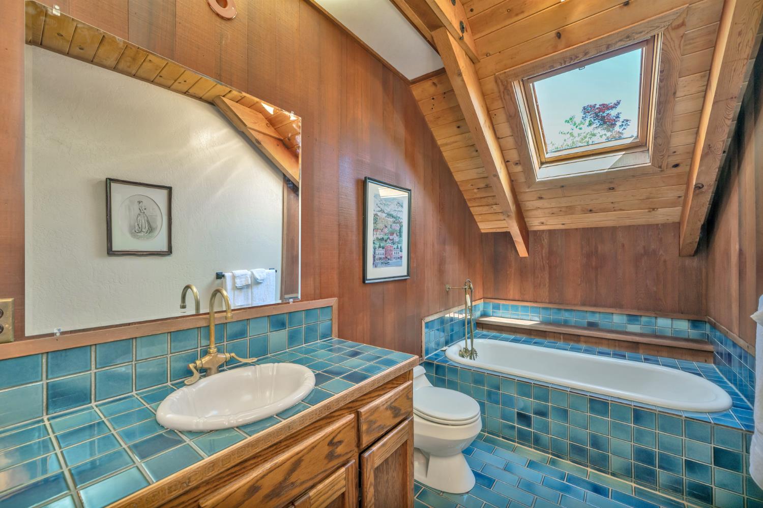2399 Kingsgate Road Placerville, CA 95667 - Photo 35 of 89 a bathroom with a granite countertop sink and a mirror