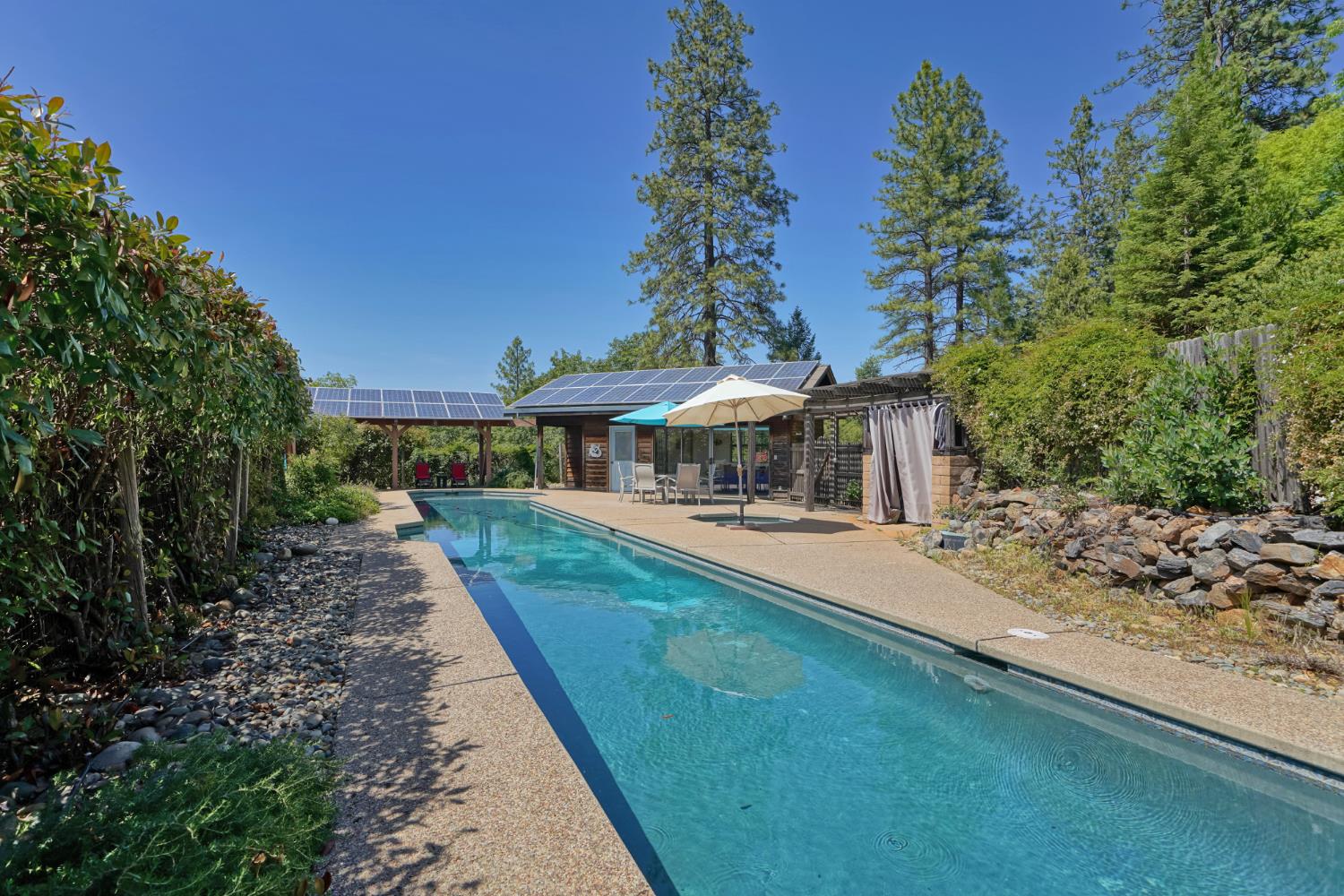 2399 Kingsgate Road Placerville, CA 95667 - Photo 54 of 89 a view of a house with backyard and sitting area