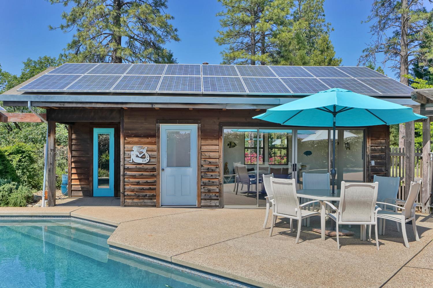 2399 Kingsgate Road Placerville, CA 95667 - Photo 55 of 89 an outdoor space with furniture and umbrella