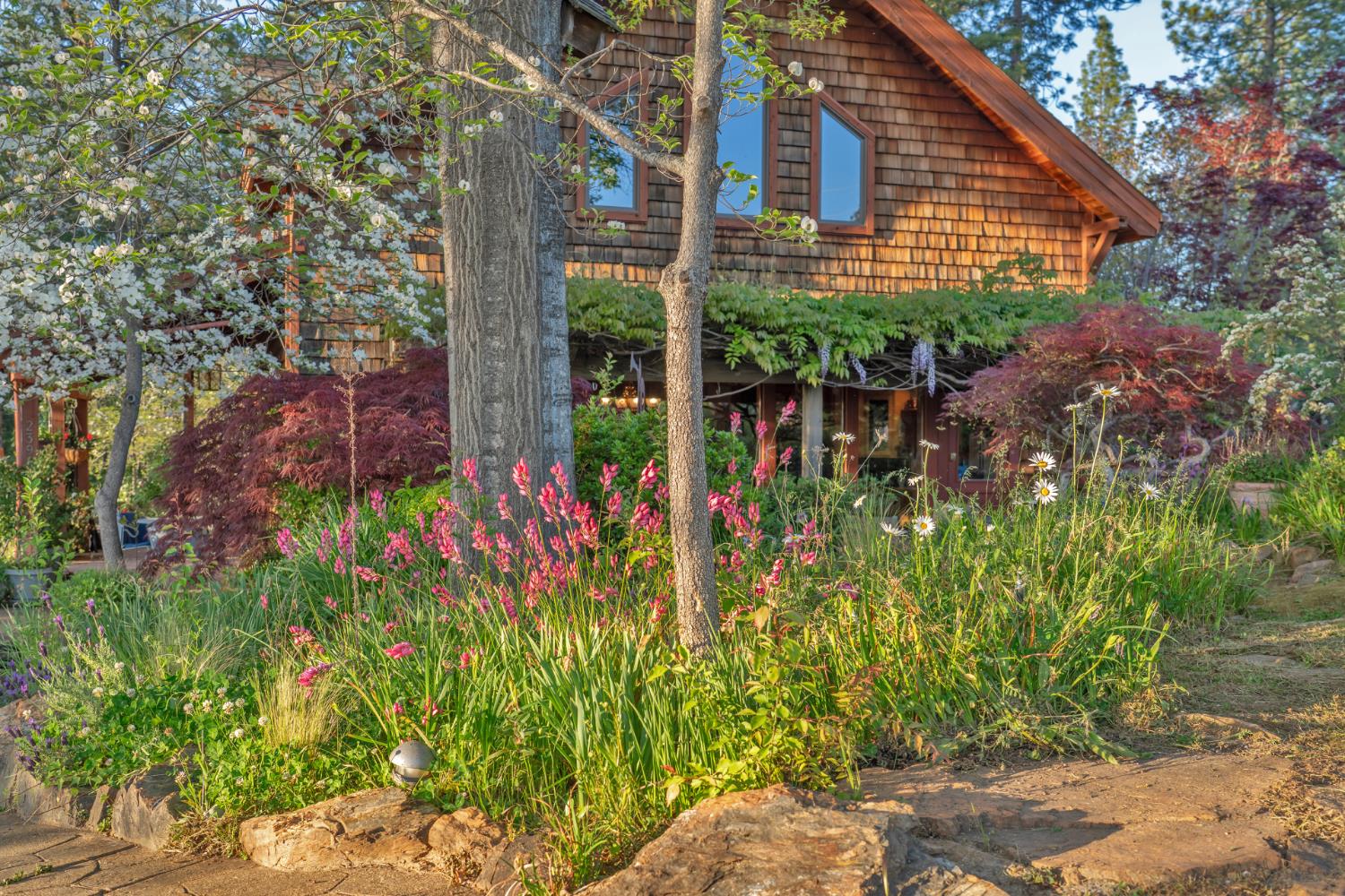 2399 Kingsgate Road Placerville, CA 95667 - Photo 81 of 89 a view of a house with a flower garden
