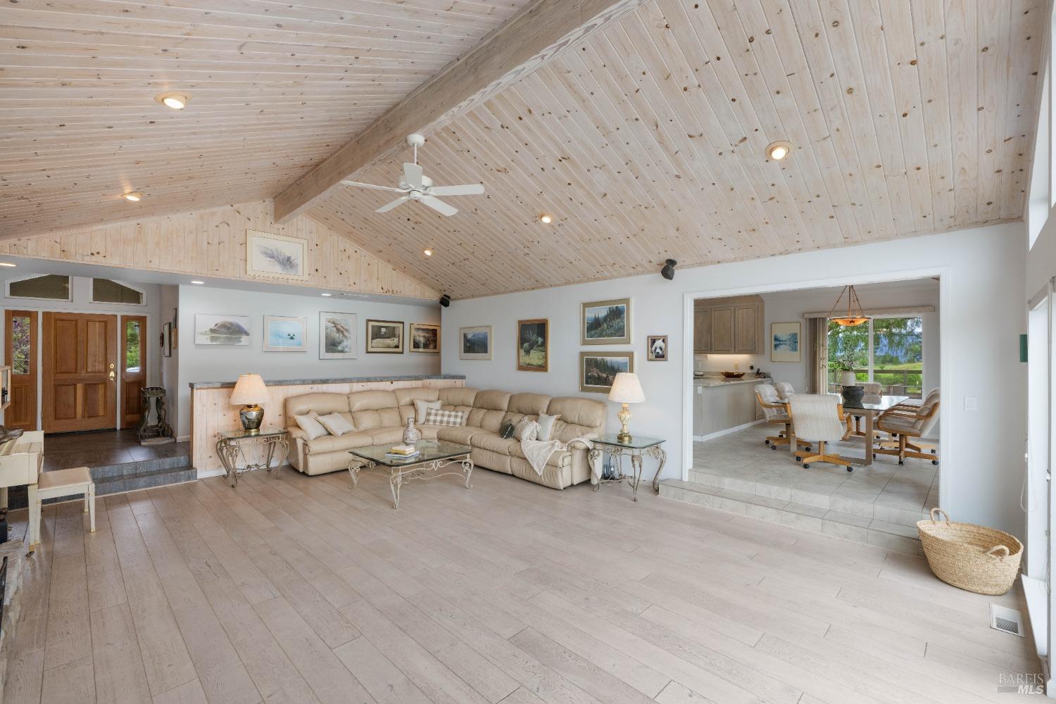127 Mountain Meadow Lane Santa Rosa, CA 95404 - Photo 6 of 24 a living room with furniture and large mirror