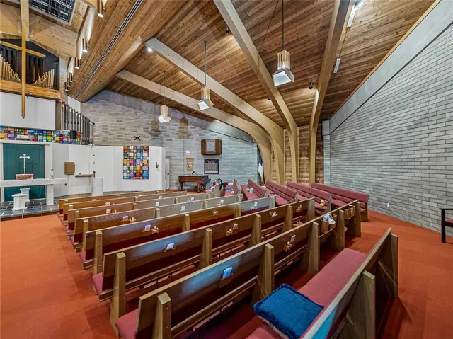 a view of a swimming pool with a bench