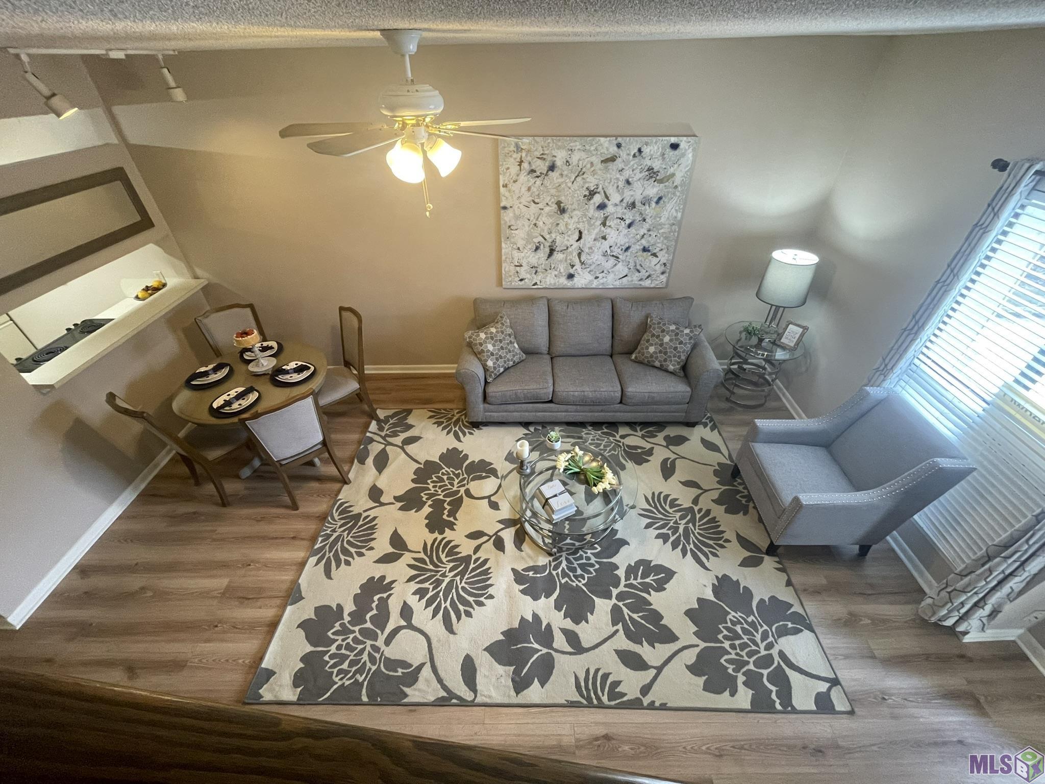 8455 Summa Avenue, Unit R3 Baton Rouge, LA 70809 - Photo 1 of 10 New Flooring installed downstairs 1-20-24