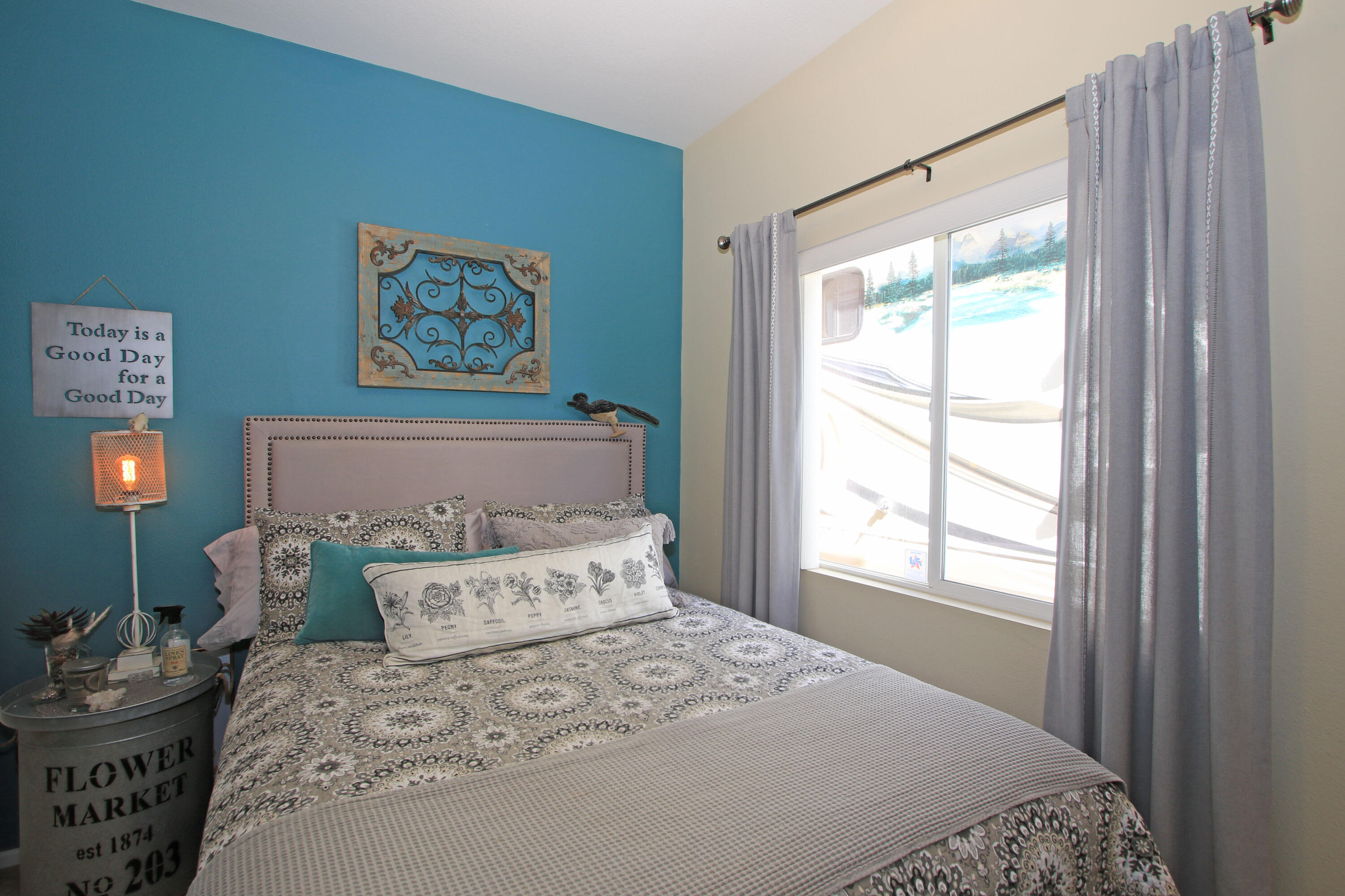 40651 Morris Street Indio, CA 92203 - Photo 26 of 47 a bedroom with a bed and a window