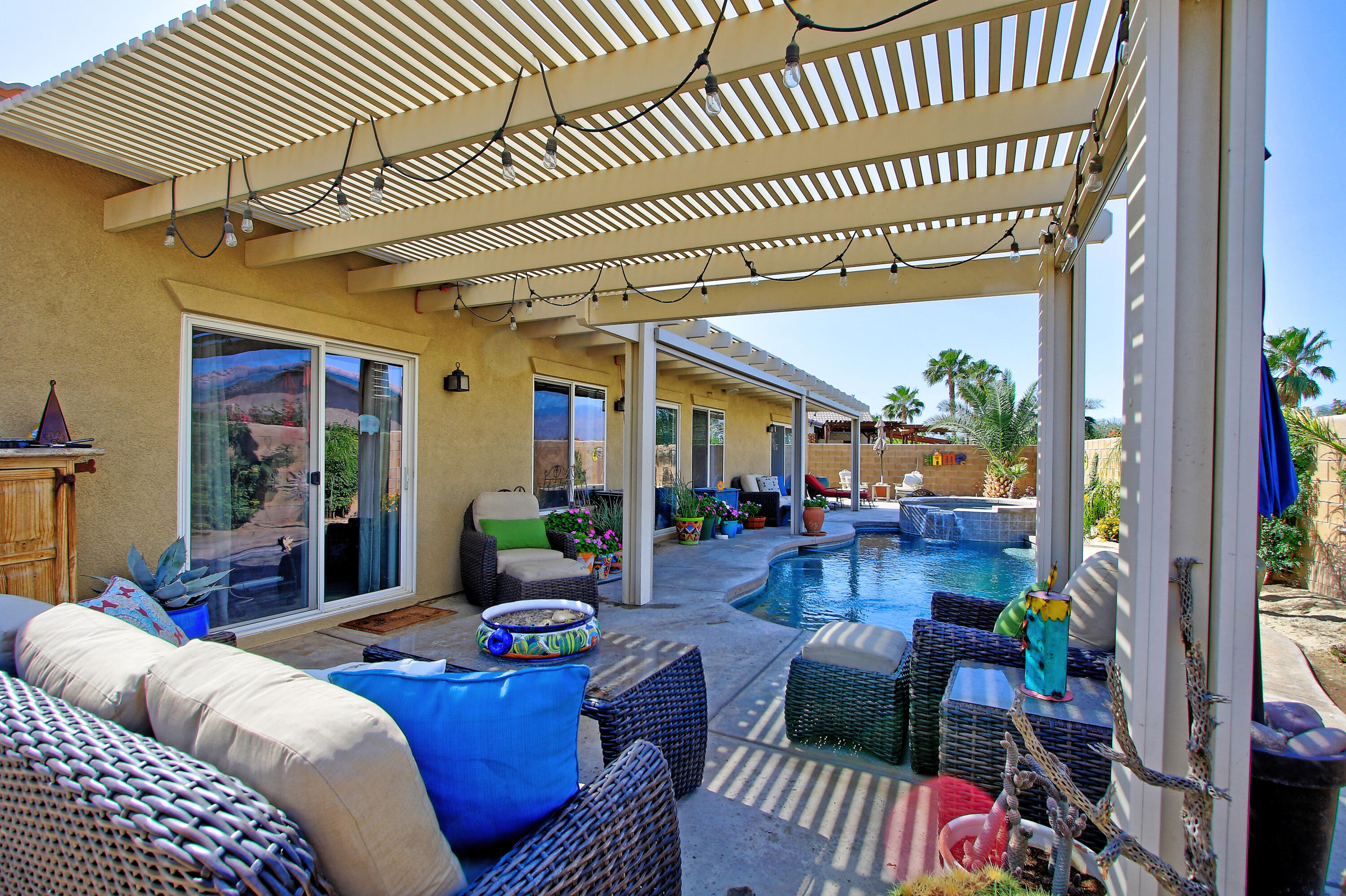 40651 Morris Street Indio, CA 92203 - Photo 31 of 47 a living room with furniture and a wooden floor
