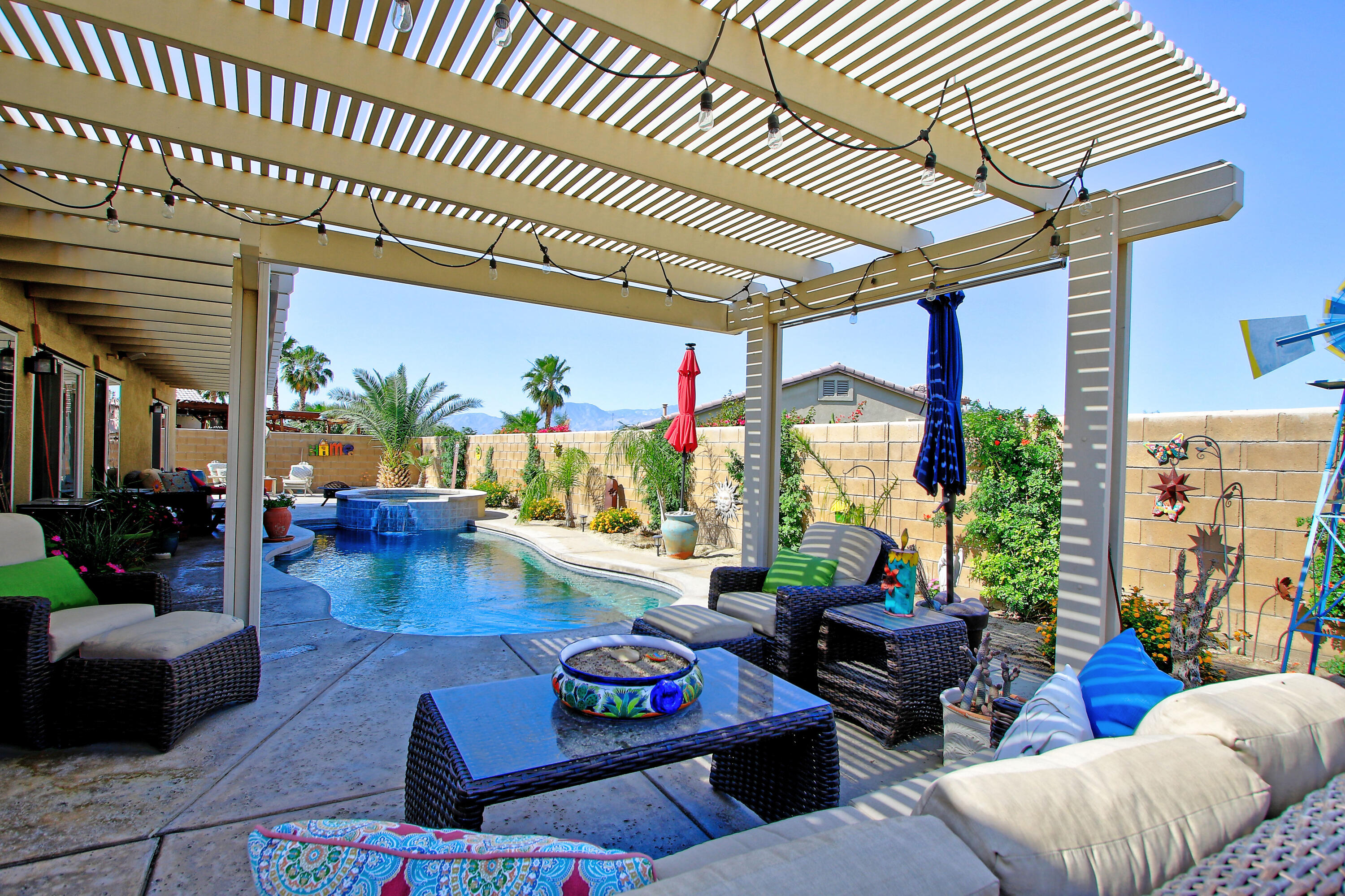 40651 Morris Street Indio, CA 92203 - Photo 32 of 47 a living room with furniture and a large window