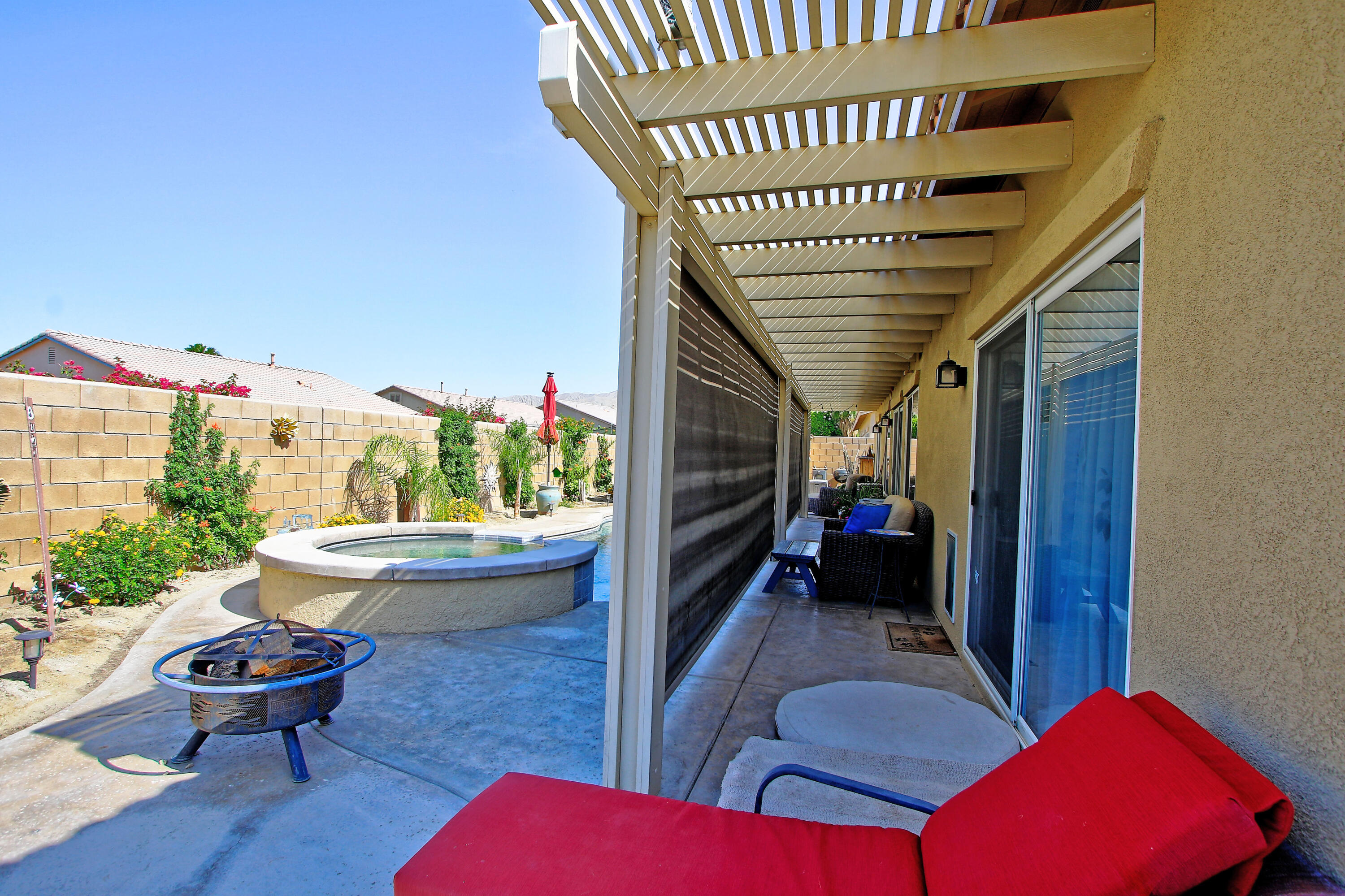 40651 Morris Street Indio, CA 92203 - Photo 35 of 47 a living room with furniture and a potted plant