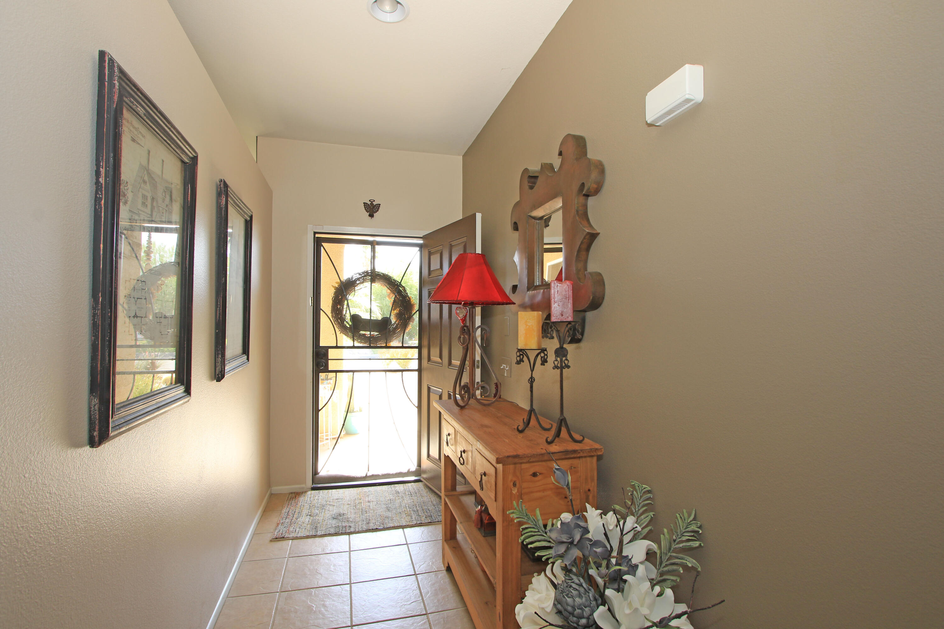 40651 Morris Street Indio, CA 92203 - Photo 4 of 47 a view of entryway and hall with wooden floor