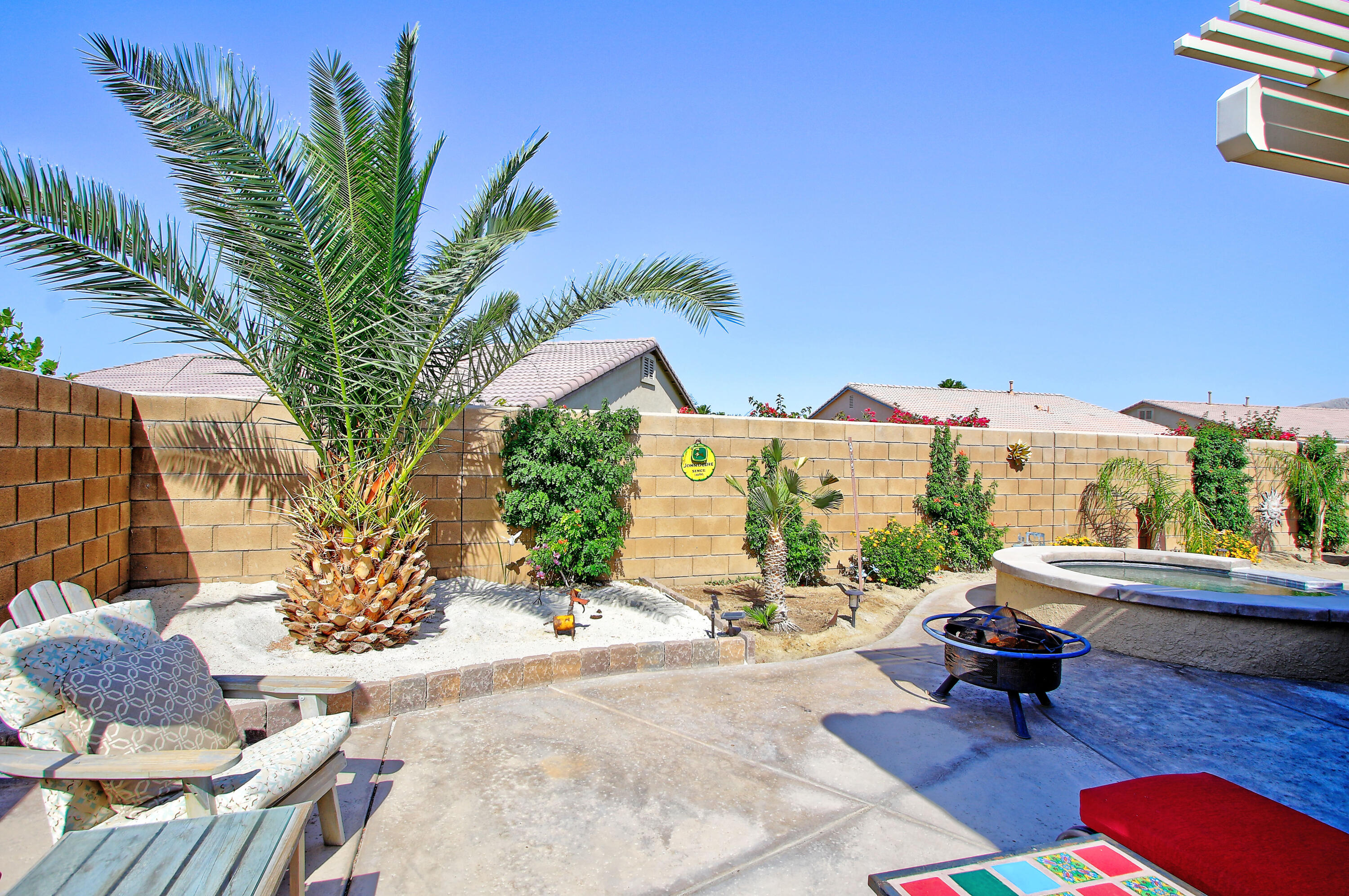 40651 Morris Street Indio, CA 92203 - Photo 41 of 47 a view of swimming pool with outdoor seating and plants