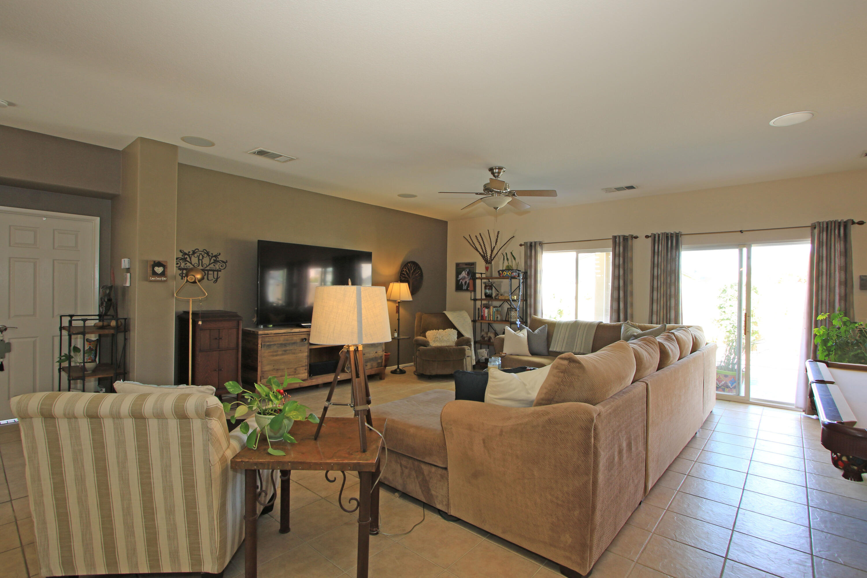 40651 Morris Street Indio, CA 92203 - Photo 5 of 47 a living room with furniture and a large window