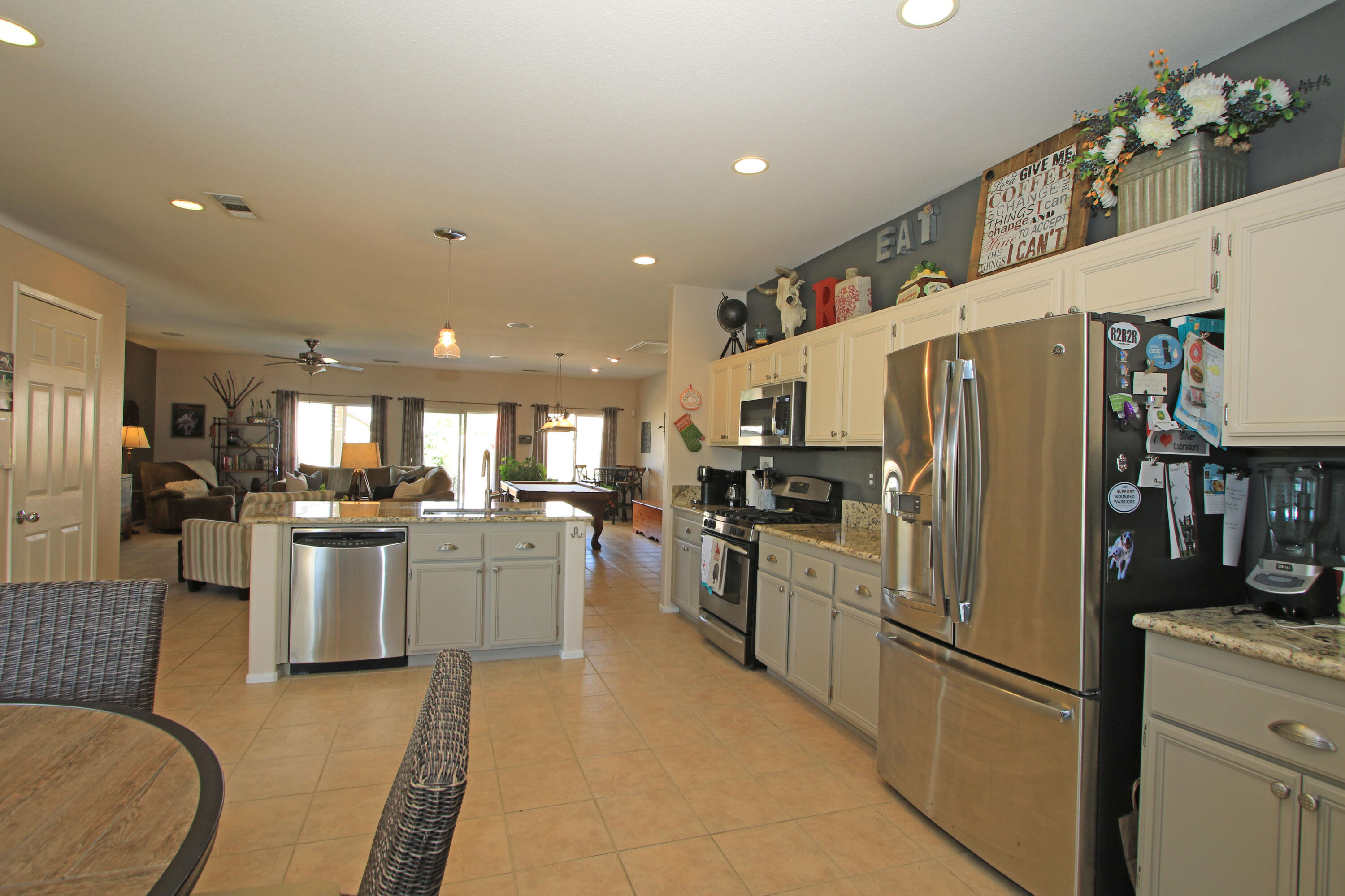40651 Morris Street Indio, CA 92203 - Photo 9 of 47 a kitchen with refrigerator and cabinets