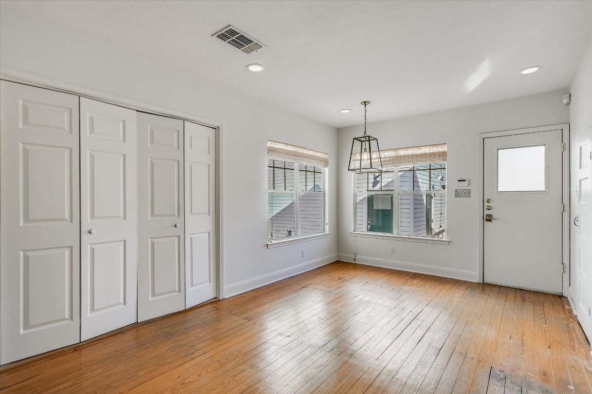 1208 East 13th Street Austin, TX 78702 - Photo 7 of 12 Foyer entrance featuring light wood-type flooring and recessed lighting
