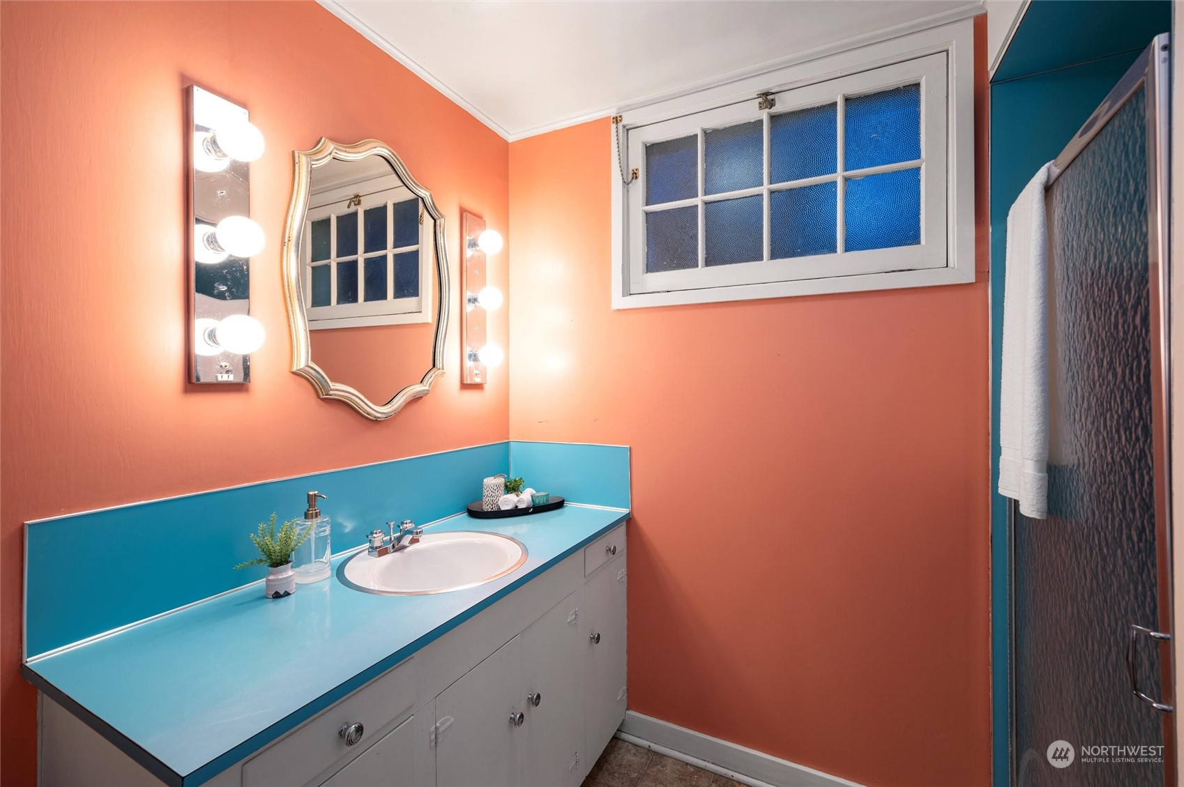 101 Willow Road Bellingham, WA 98225 - Photo 29 of 40 a bathroom with a sink mirror and vanity
