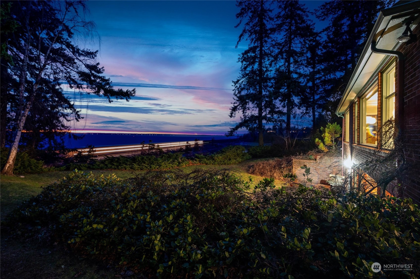101 Willow Road Bellingham, WA 98225 - Photo 3 of 40 a view of a yard with a house in a yard