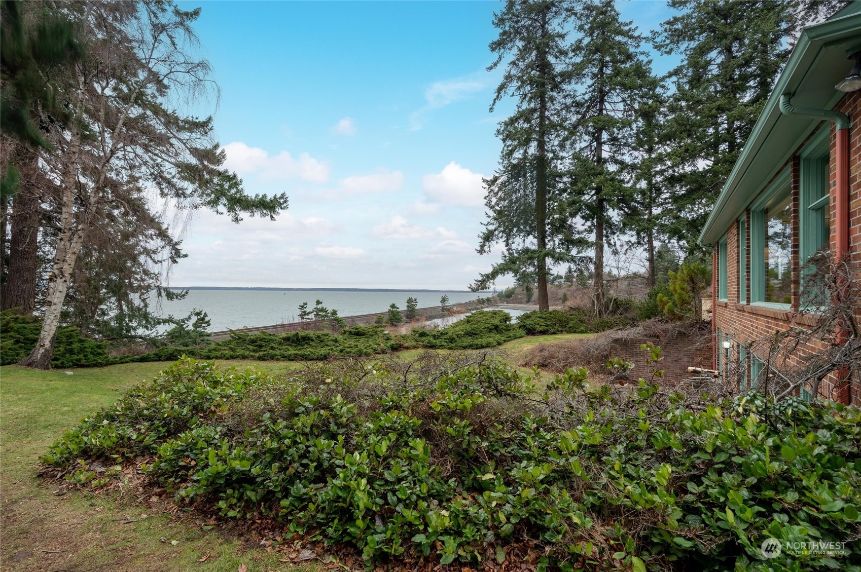 101 Willow Road Bellingham, WA 98225 - Photo 34 of 40 a view of a garden with large trees