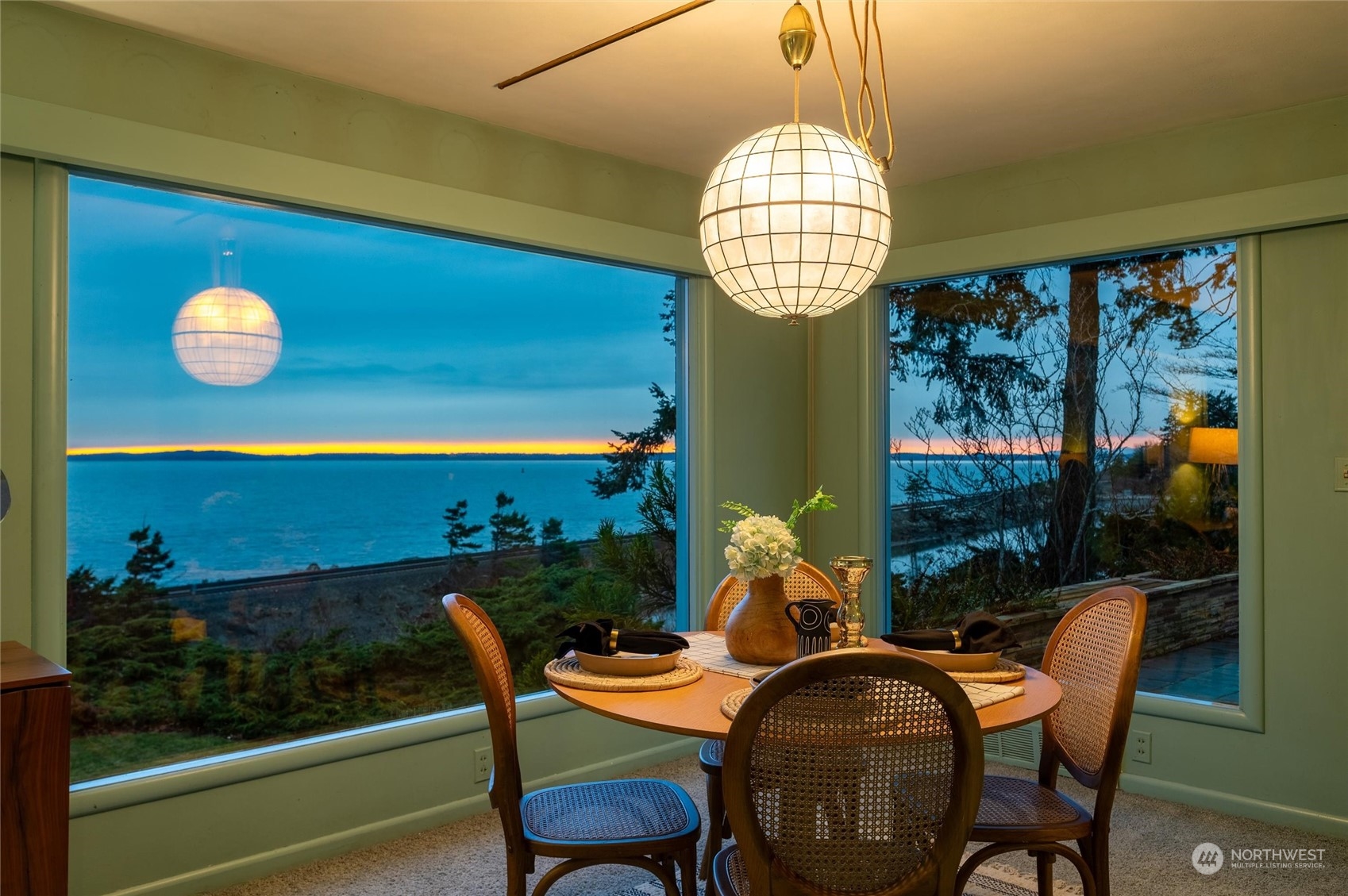 101 Willow Road Bellingham, WA 98225 - Photo 8 of 40 a view of a dining room with furniture wooden floor and chandelier