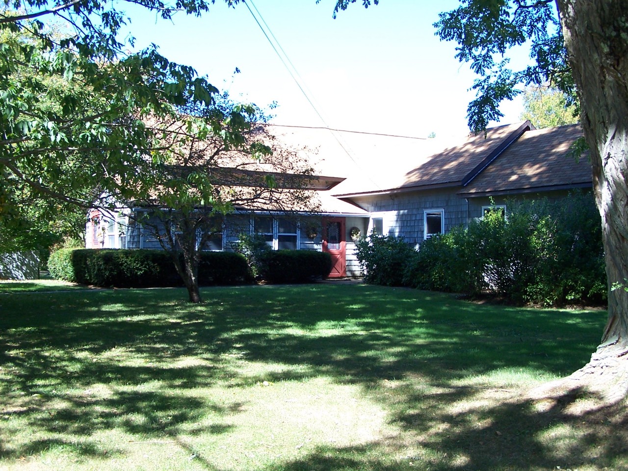 879 Wade Inn Road Becket, MA 01223 - Photo 2 of 29 a view of a house with a yard