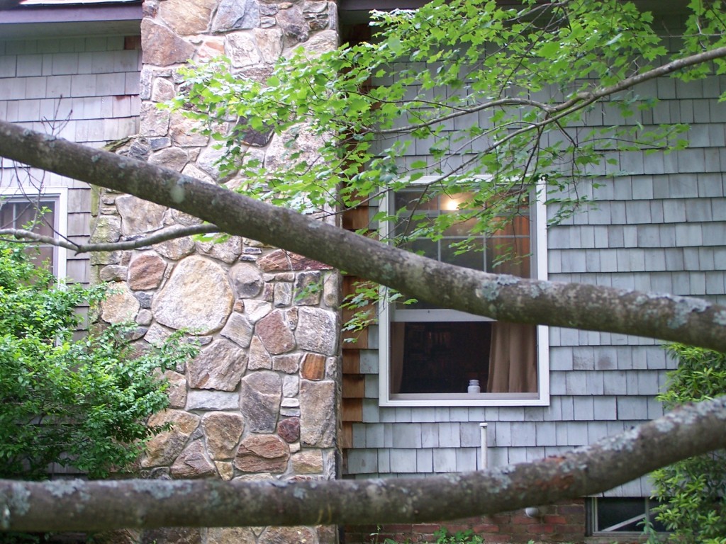 879 Wade Inn Road Becket, MA 01223 - Photo 14 of 29 a front view of a house with a yard