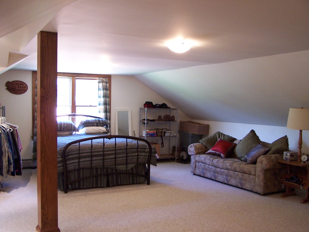 879 Wade Inn Road Becket, MA 01223 - Photo 16 of 29 a bedroom with bed and a window
