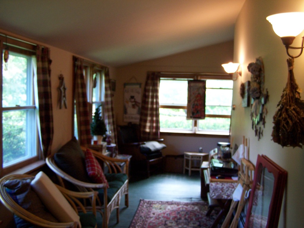 879 Wade Inn Road Becket, MA 01223 - Photo 19 of 29 a living room with furniture and a large window