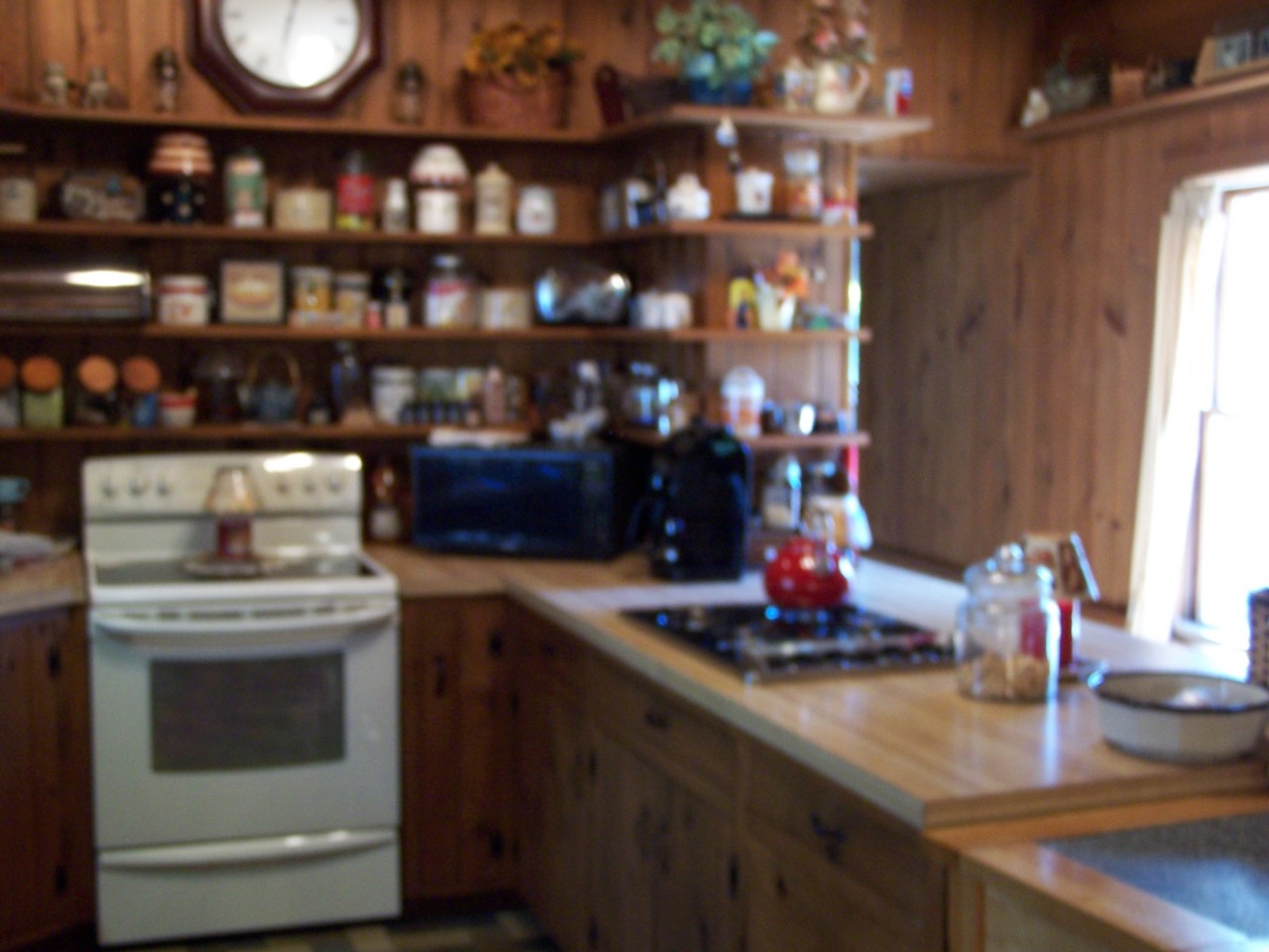 879 Wade Inn Road Becket, MA 01223 - Photo 7 of 29 a kitchen with a stove and a sink