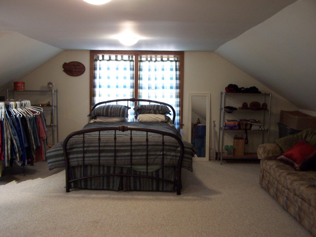 879 Wade Inn Road Becket, MA 01223 - Photo 8 of 29 a bedroom with a bed and a window