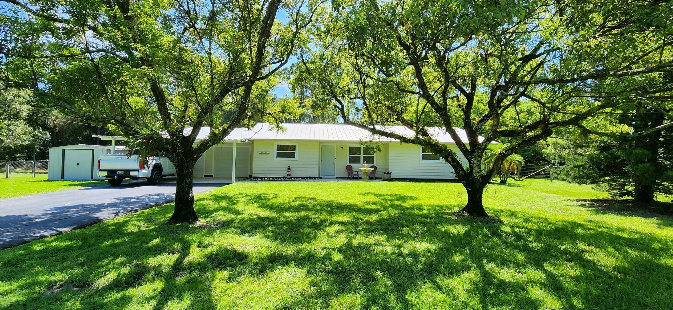 17463 Alexander Run Jupiter, FL 33478 - Photo 1 of 28 20230811_111920