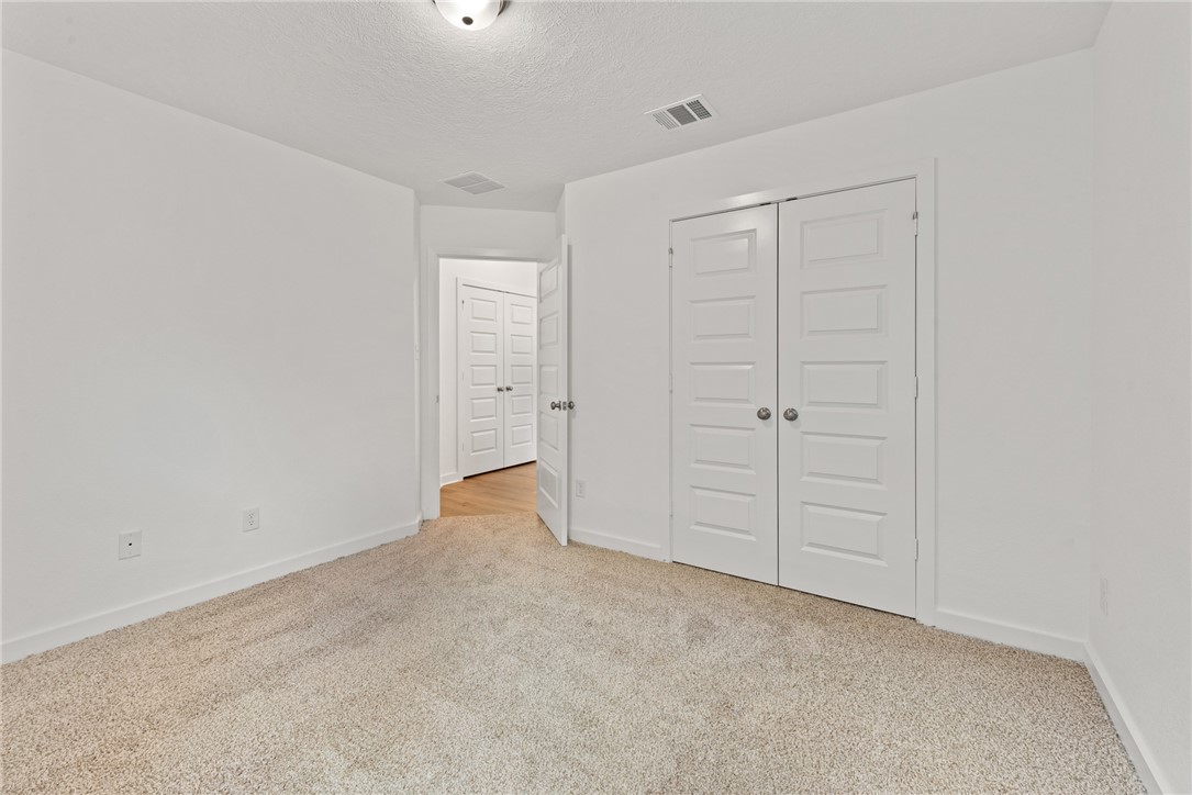 2426 Rooke Road Bryan, TX 77807 - Photo 27 of 39 an empty room with white cabinet