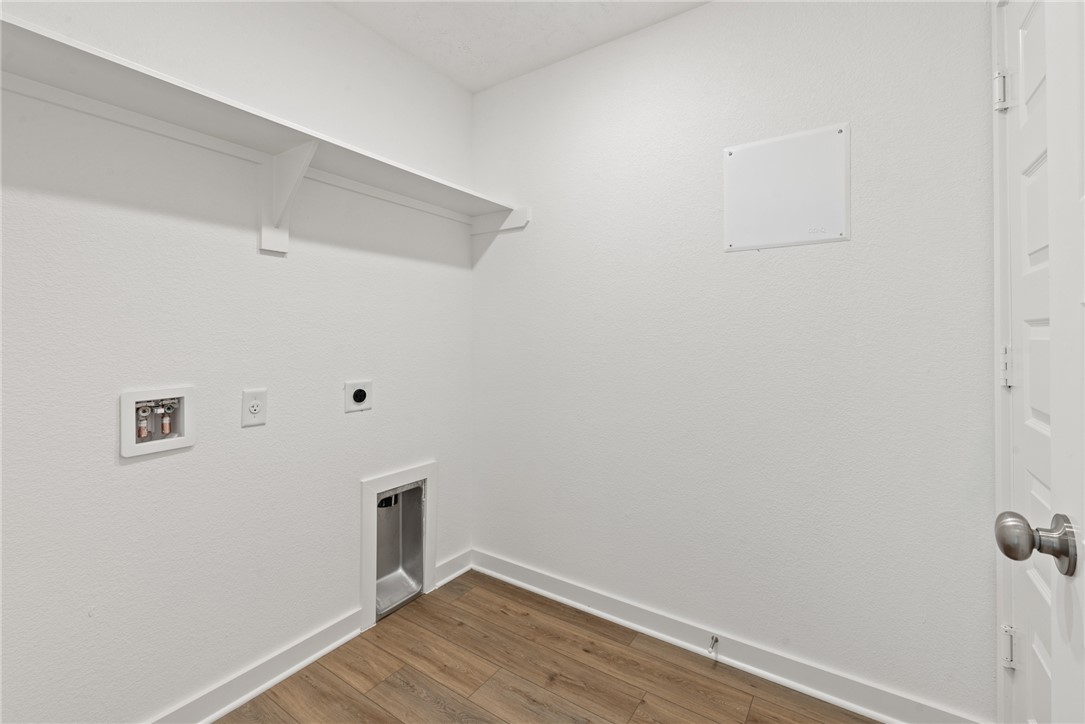 2426 Rooke Road Bryan, TX 77807 - Photo 29 of 39 a view of a room with wooden floor