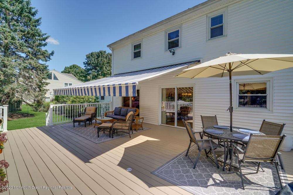 34 Hawthorne Road Red Bank, NJ 07701 - Photo 47 of 54 Deck with retractable electric awning
