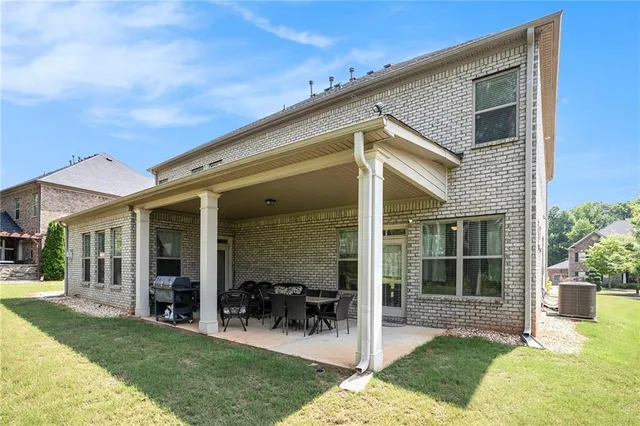 a view of a house with patio