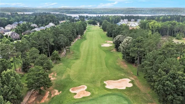 a view of a lake with a city