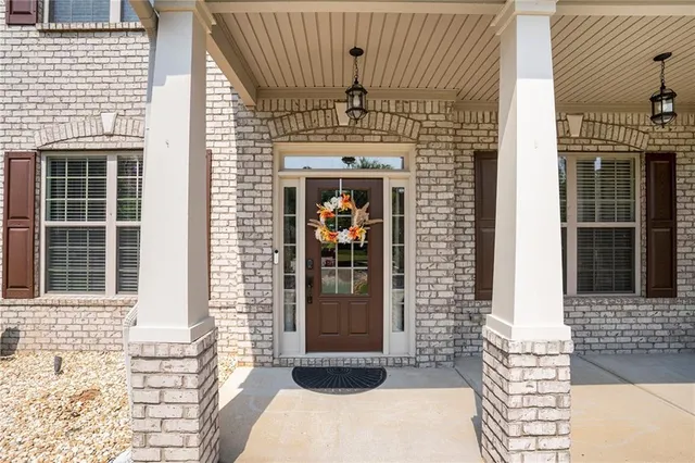 a front view of a house with a outdoor space