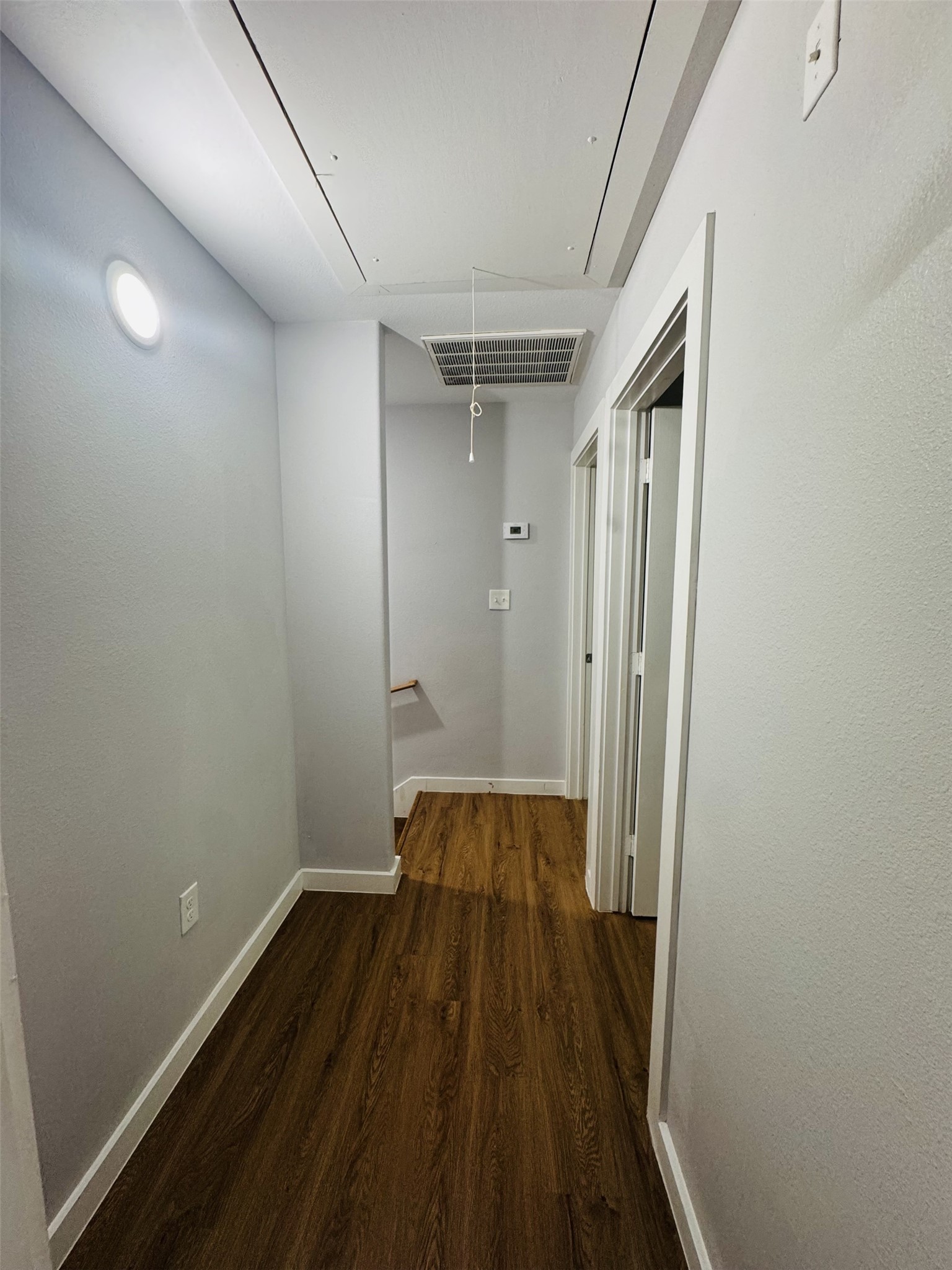 6606 Haight Street Houston, TX 77028 - Photo 11 of 23 a view of a hallway with wooden floor