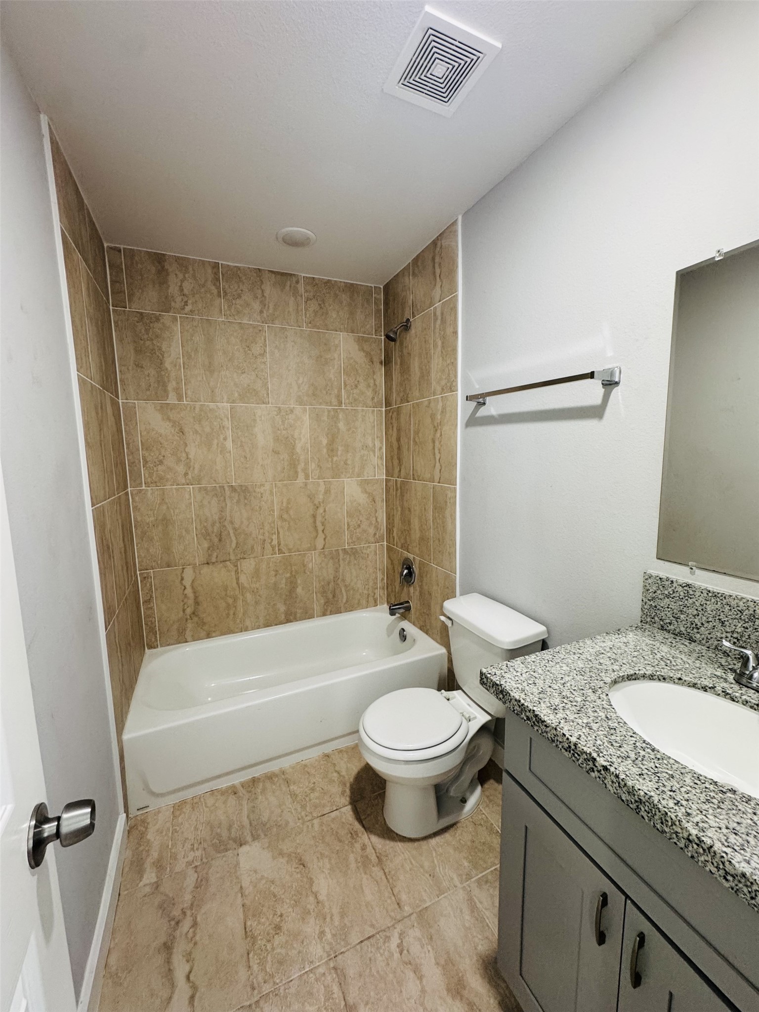6606 Haight Street Houston, TX 77028 - Photo 17 of 23 a bathroom with a granite countertop sink toilet and shower