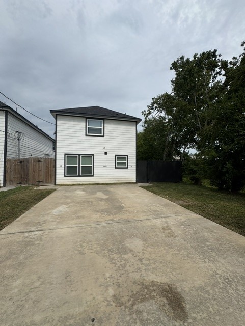 6606 Haight Street Houston, TX 77028 - Photo 23 of 23 a house with trees in the background
