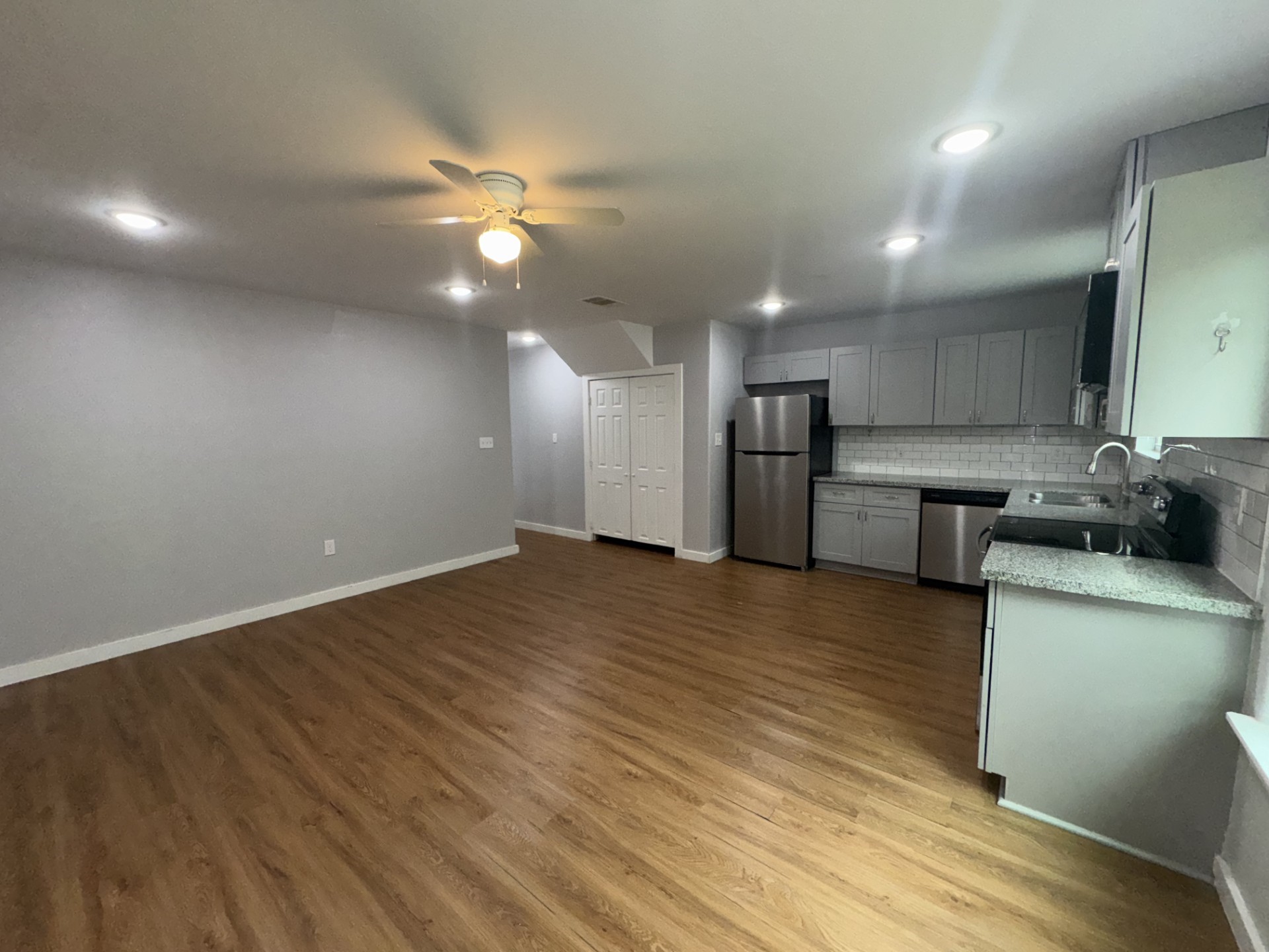 6606 Haight Street Houston, TX 77028 - Photo 4 of 23 a view of a kitchen with a sink and a refrigerator