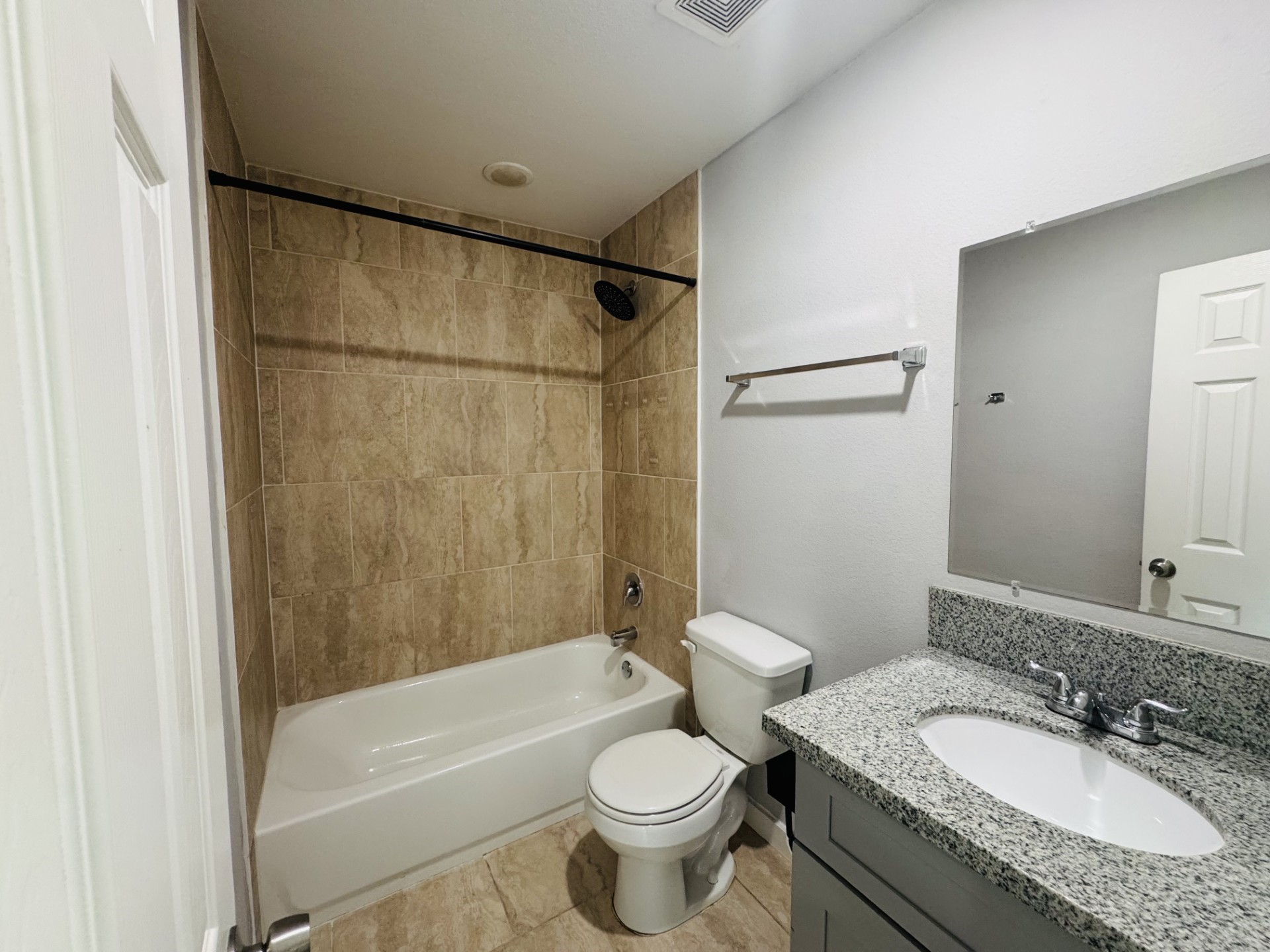 6606 Haight Street Houston, TX 77028 - Photo 8 of 23 a bathroom with a granite countertop sink toilet and shower
