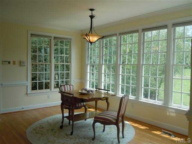 4307 Thetford Road Durham, NC 27707 - Photo 12 of 25 Another view of the breakfast nook featuring a wall of windows! Breakfast Area