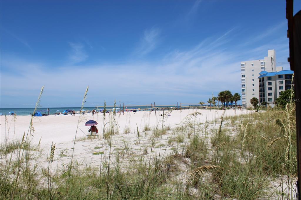 6800 Sunset Way, Unit 1708 St. Pete Beach, FL 33706 - Photo 12 of 15 a view of swimming pool and yard