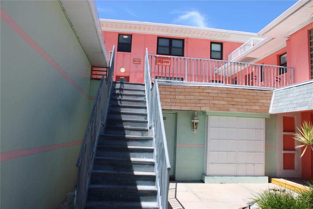 6800 Sunset Way, Unit 1708 St. Pete Beach, FL 33706 - Photo 2 of 15 a view of entryway with a front door