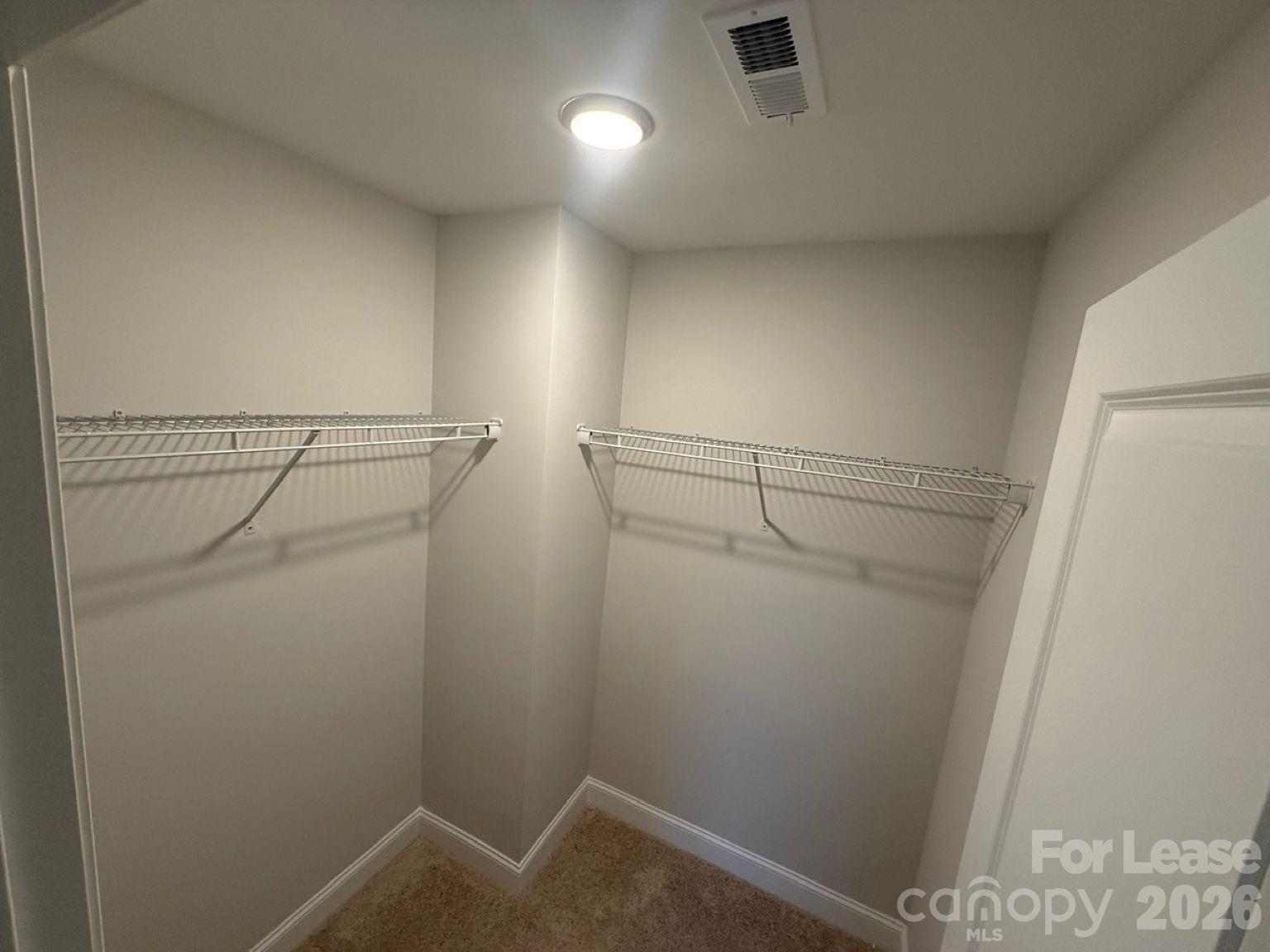 5593 Stafford Road Charlotte, NC 28215 - Photo 13 of 23 a view of a room with racks on the wall